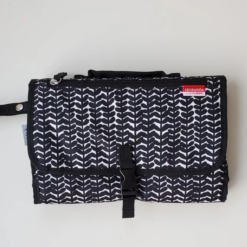 NWOT skidaddle change station babt diaper care bag